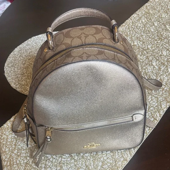 Coach | Bags | Coach Metallic Gold And Brown Backpack | Poshmark display picture 1